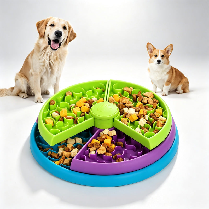 Dog puzzle feeder with rotating layers in green, purple and blue, two dogs waiting to play