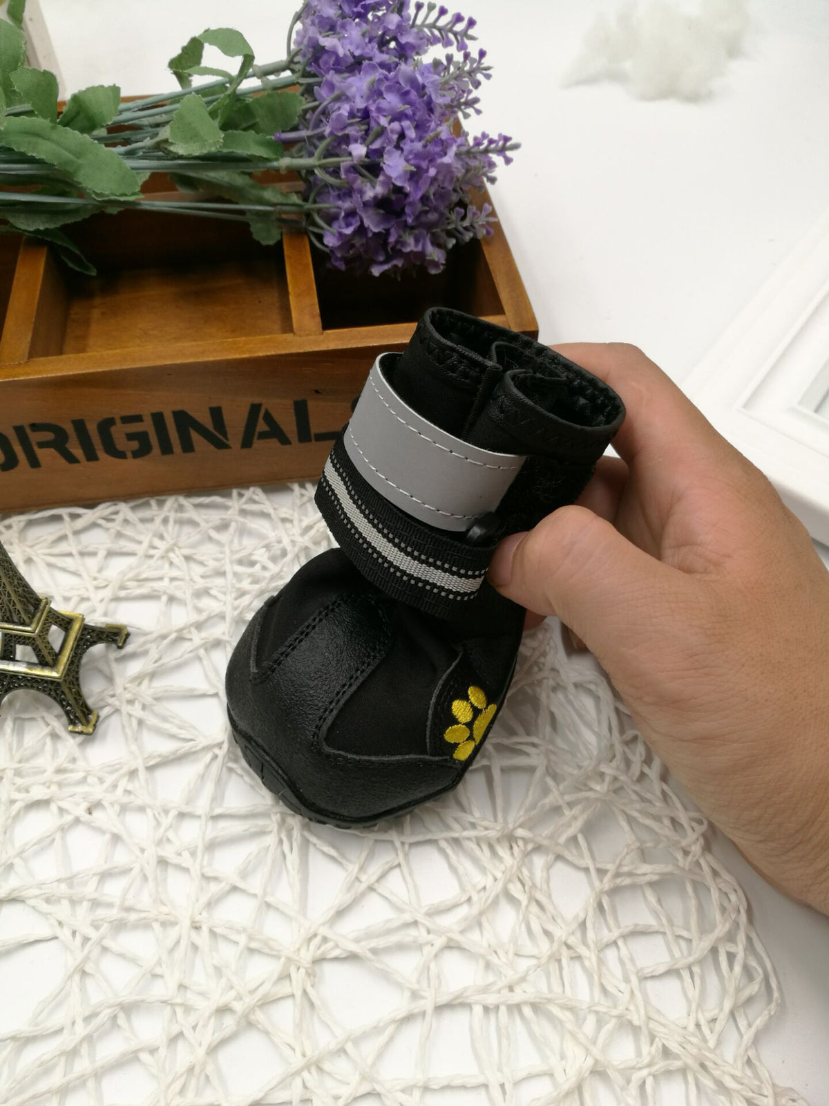 Set of black dog shoes with velcro straps
