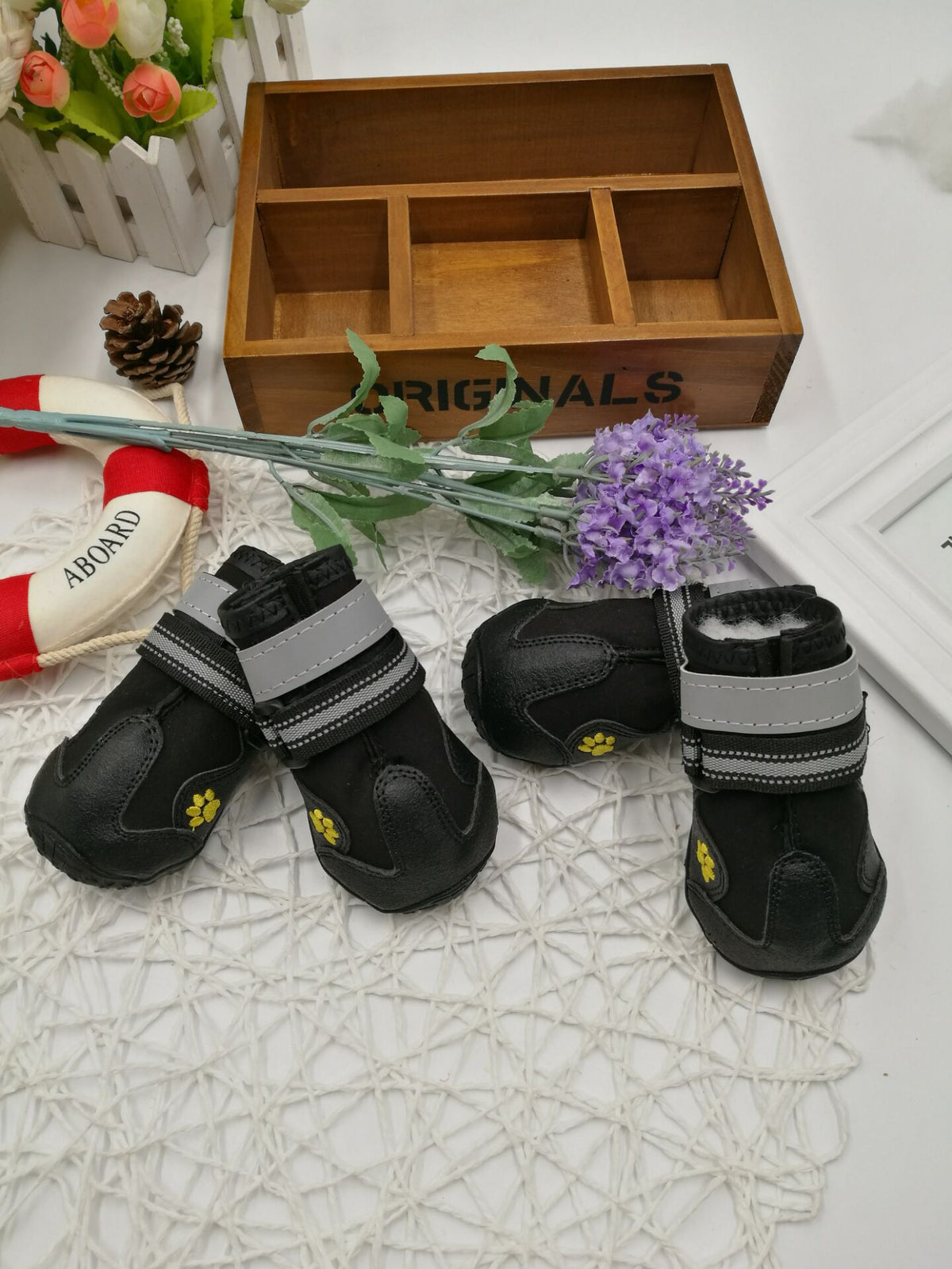 Winter dog shoes with rugged grip soles, side view